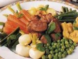 Recette Selle d'agneau entourée des petits légumes.
