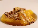Recette Salade gourmande d'oranges au sirop vanillé, amandes et copeaux de chocolat