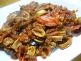 Recette Wok de seiches au saté et tomates confites