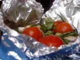 Recette Papillotes de cabillaud aux tomates cerises oignons jeunes et basilic - 2pts/pers