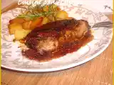 Recette Rouelle de porc laquée au miel, thym et romarin.