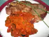Recette Côte de porc et sa sauce corsée à la tomate