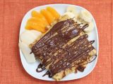 Recette Blintzes à la ricotta, salade de fruits & chocolat fondu