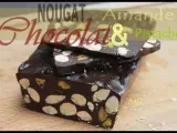 Recette Du nougat au chocolat noir incrusté d' amandes et de pistaches grillées .