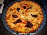 Recette Tarte au thon, parmesan, olives et tomates confites.