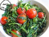 Recette Poêlée de roquette et de tomates cerise à l'ail