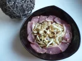 Recette Salade de chou blanc, magret de canard, pignons, raisins et tome