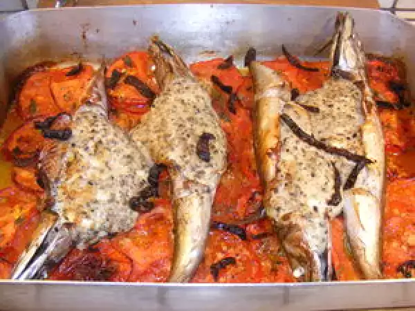 Recette Maquereaux farcis à la tapenade sur lit de tomates confites