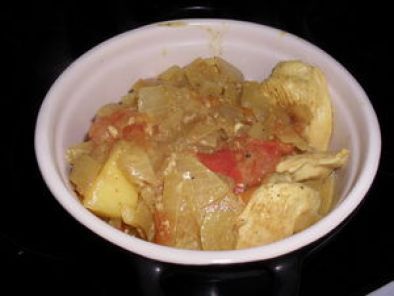 Recette Cassolette de poulet au curry et ananas.