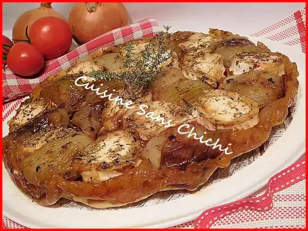 Recette Tarte tatin aux oignons, tomates et fromage de chèvre.