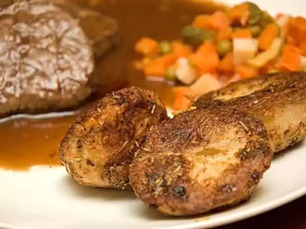 Recette Pommes de terre au four au parmesan et au romarin