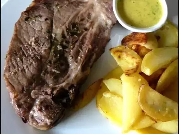 Recette Côte de porc aux deux pommes et sa sauce au curry