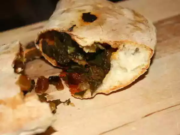 Recette Petits chaussons fourrés aux blettes, raisins secs et chèvre