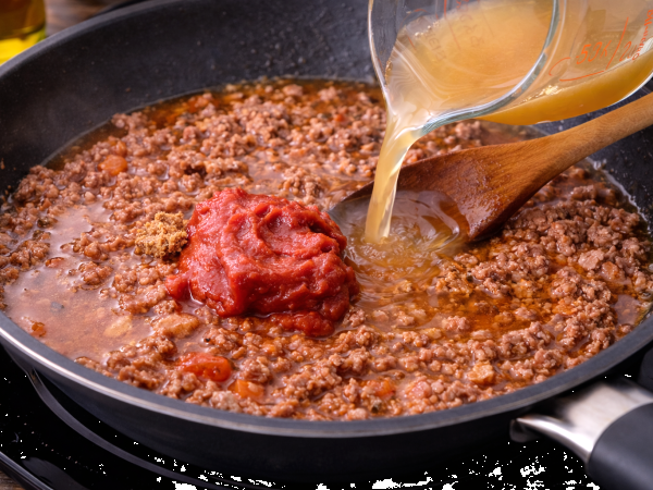 Mijoté épicé de viande hachée et tomates - Préparation etape 4