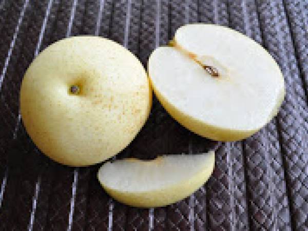 Riz au lait de coco, poire japonaise, gingembre confit et sésame noir - Préparation etape 2