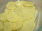 Etape 3 - Gratin de pommes de terre aux chicons, cheddar et lardons