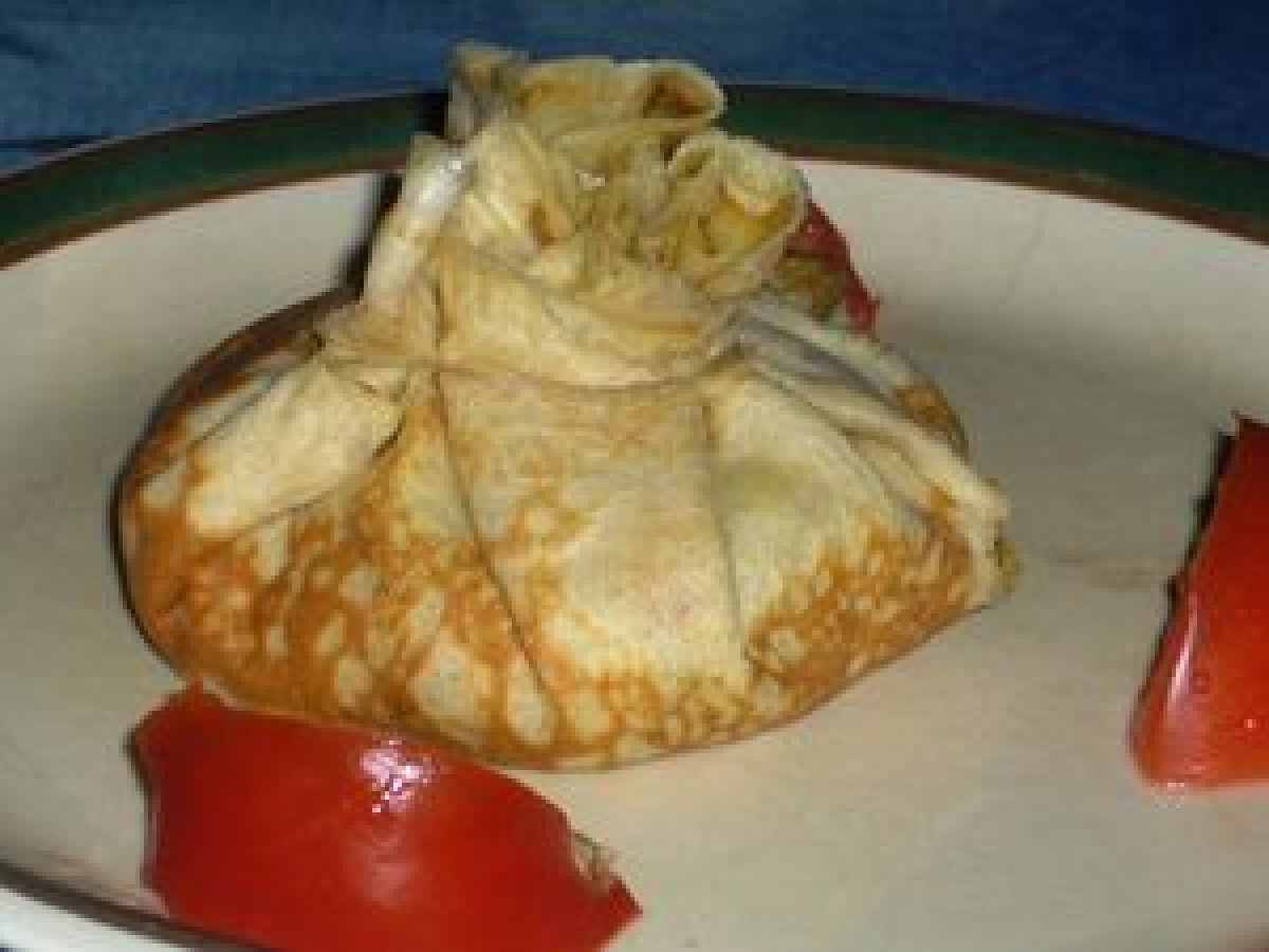 Aumonière de poulet et fondue de poireaux Recette Ptitchef