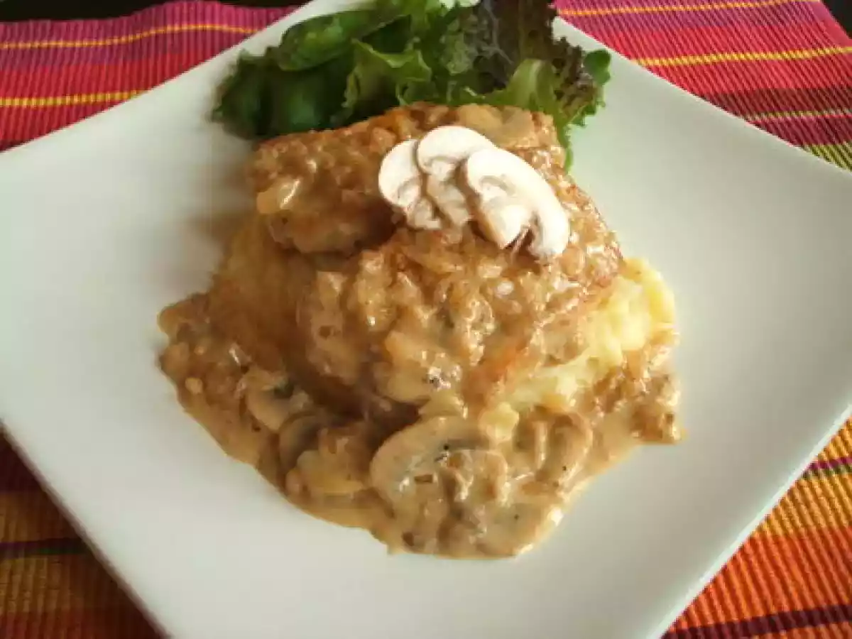 Côtes de porc aux champignons et à la crème au porto