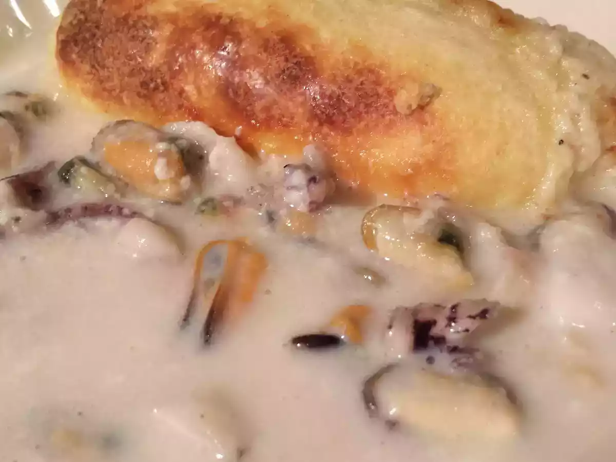 Gratin de fruits de mer et quenelles de brochet