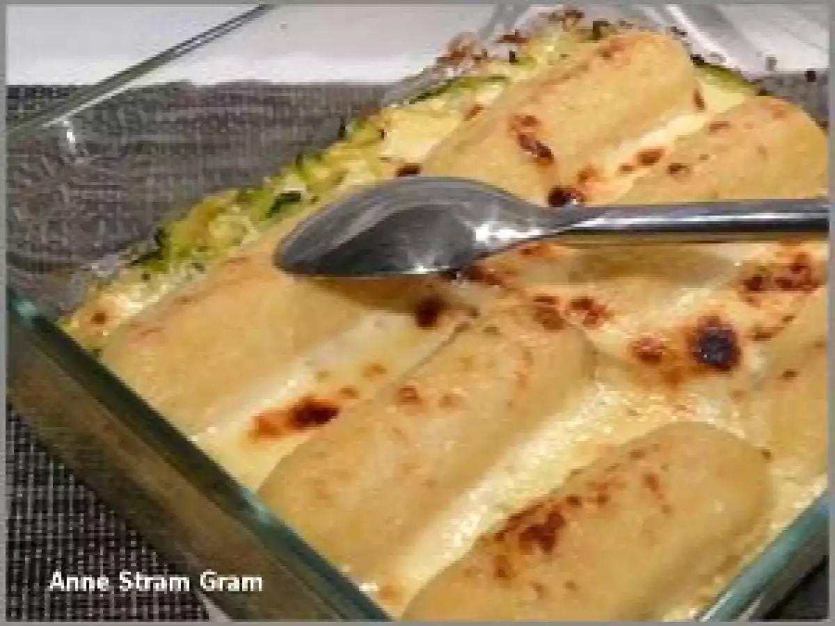 Gratin de quenelles de brochet sur lit de courgettes et crème de parmesan
