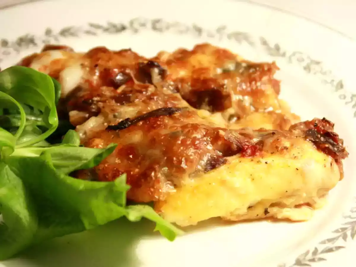 Gratin de quenelles, sauce aux aubergines & mozzarella