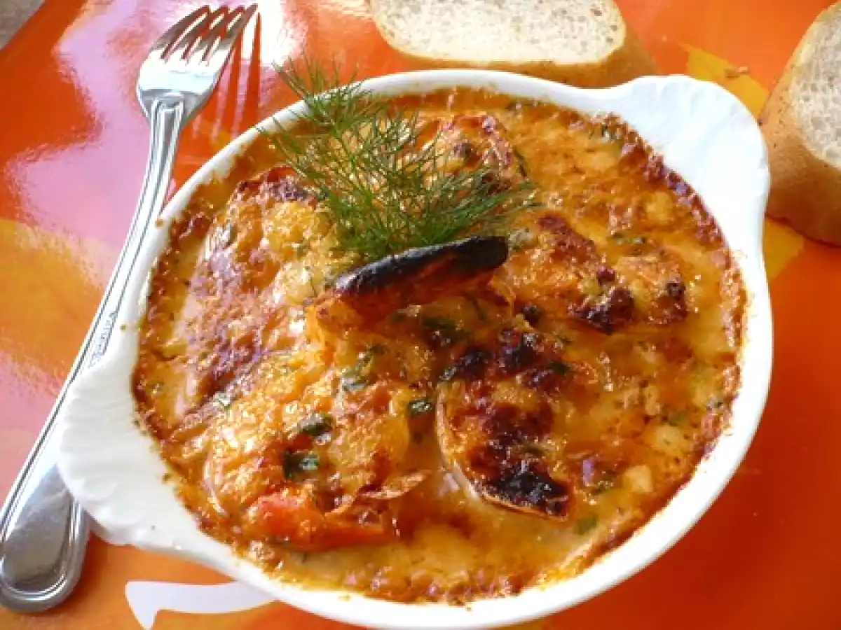 Gratin de scampis au pastis et baies roses