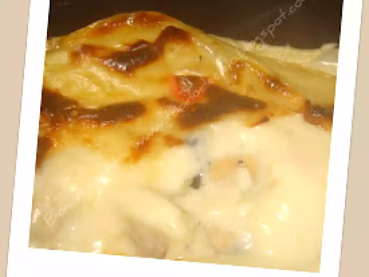 Méli-mélo gratiné de poisson et fruits de mer sauce curry. - photo 2