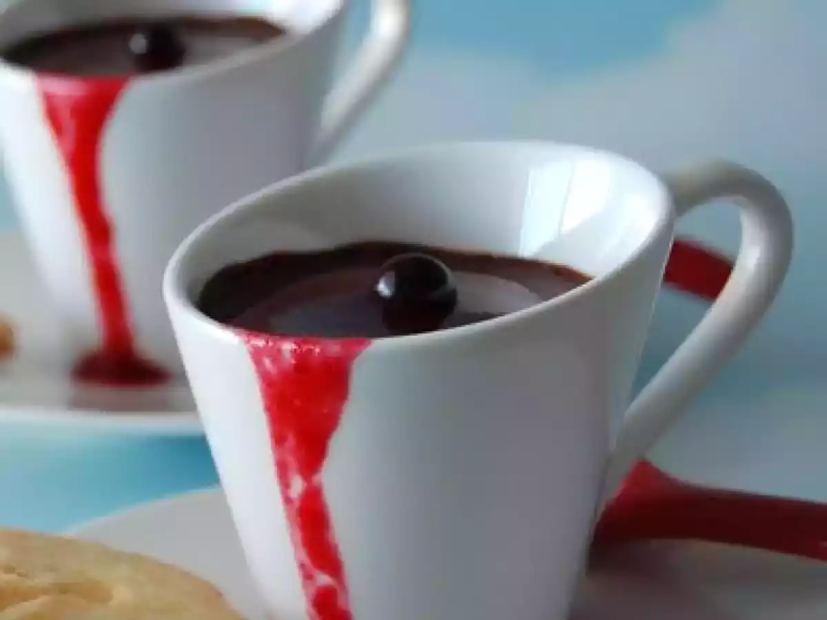 Mousse au chocolat et son coulis de framboises - photo 2