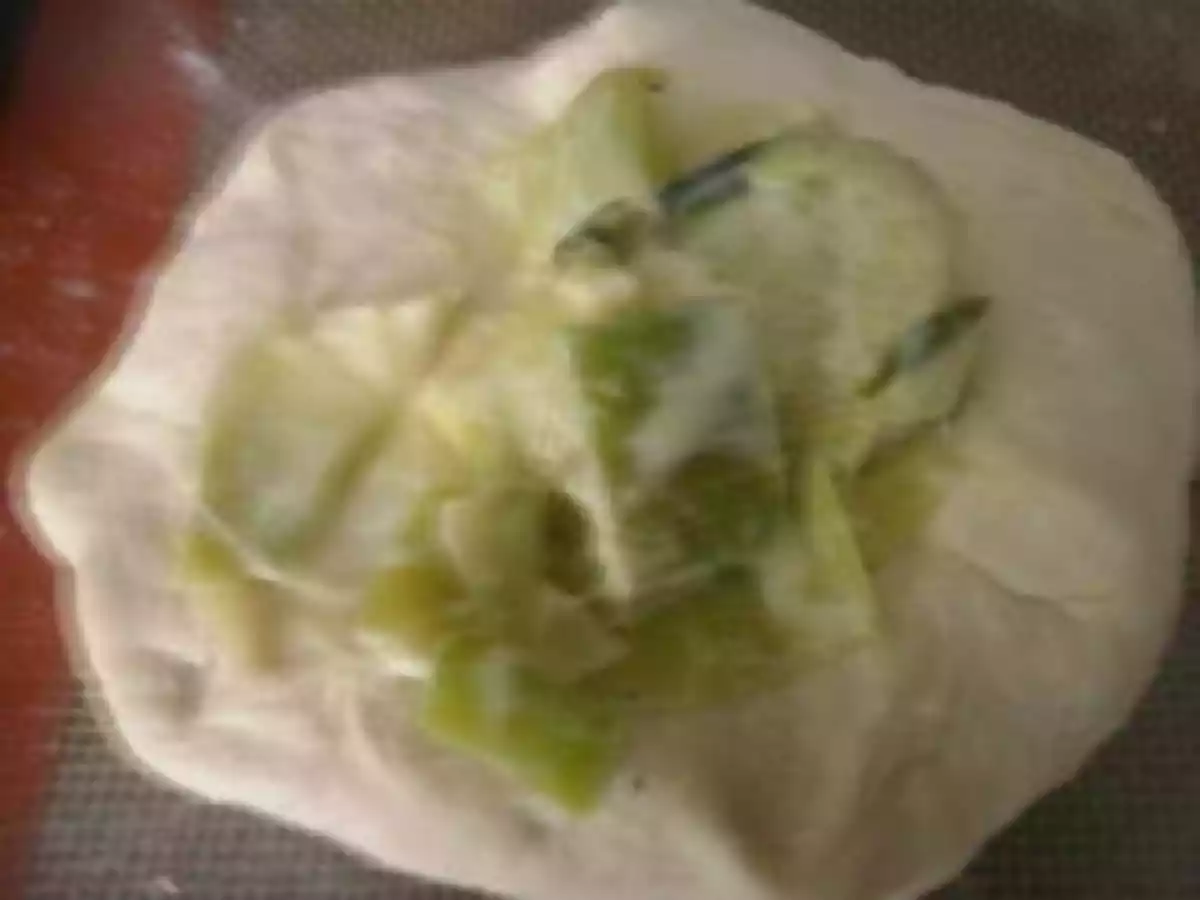 Naans fourrés à la fondue de poireaux.