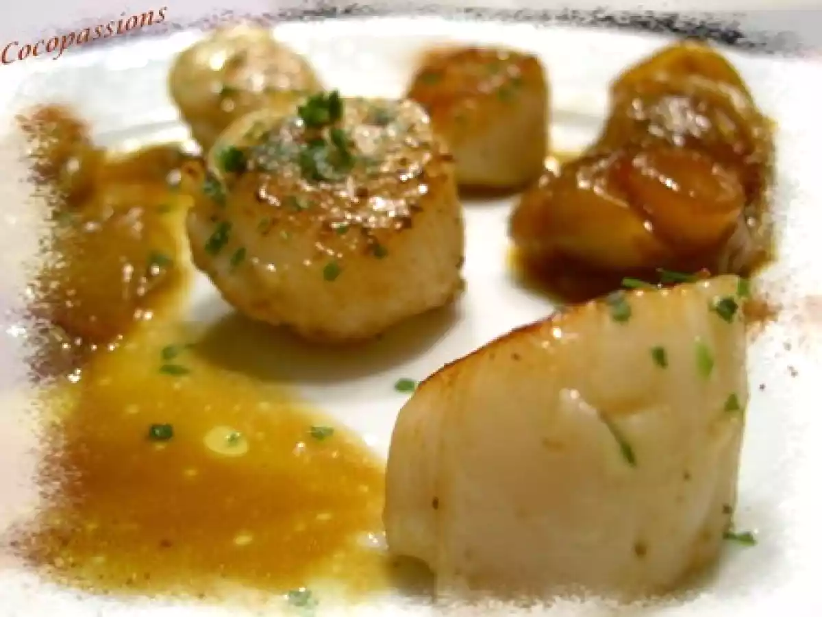 Noix de St Jacques aux endives confites à l' orange et à la coriandre