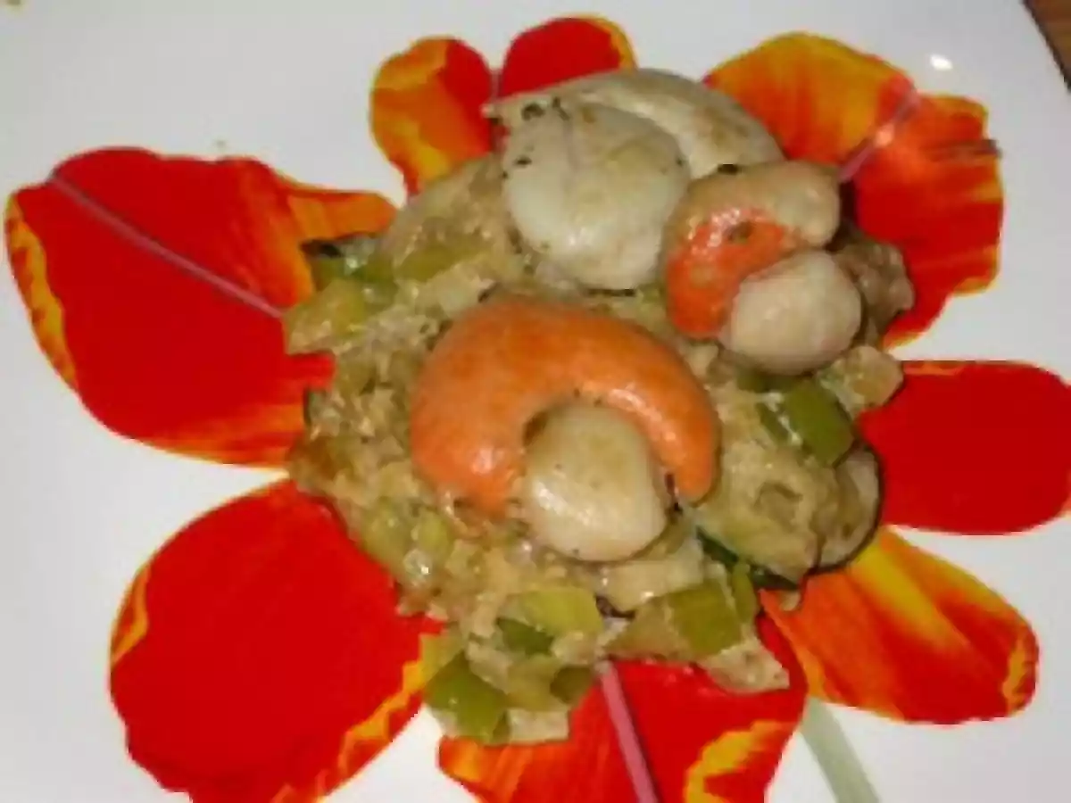 Noix de St Jacques sur un lit de Poireaux-Courgette