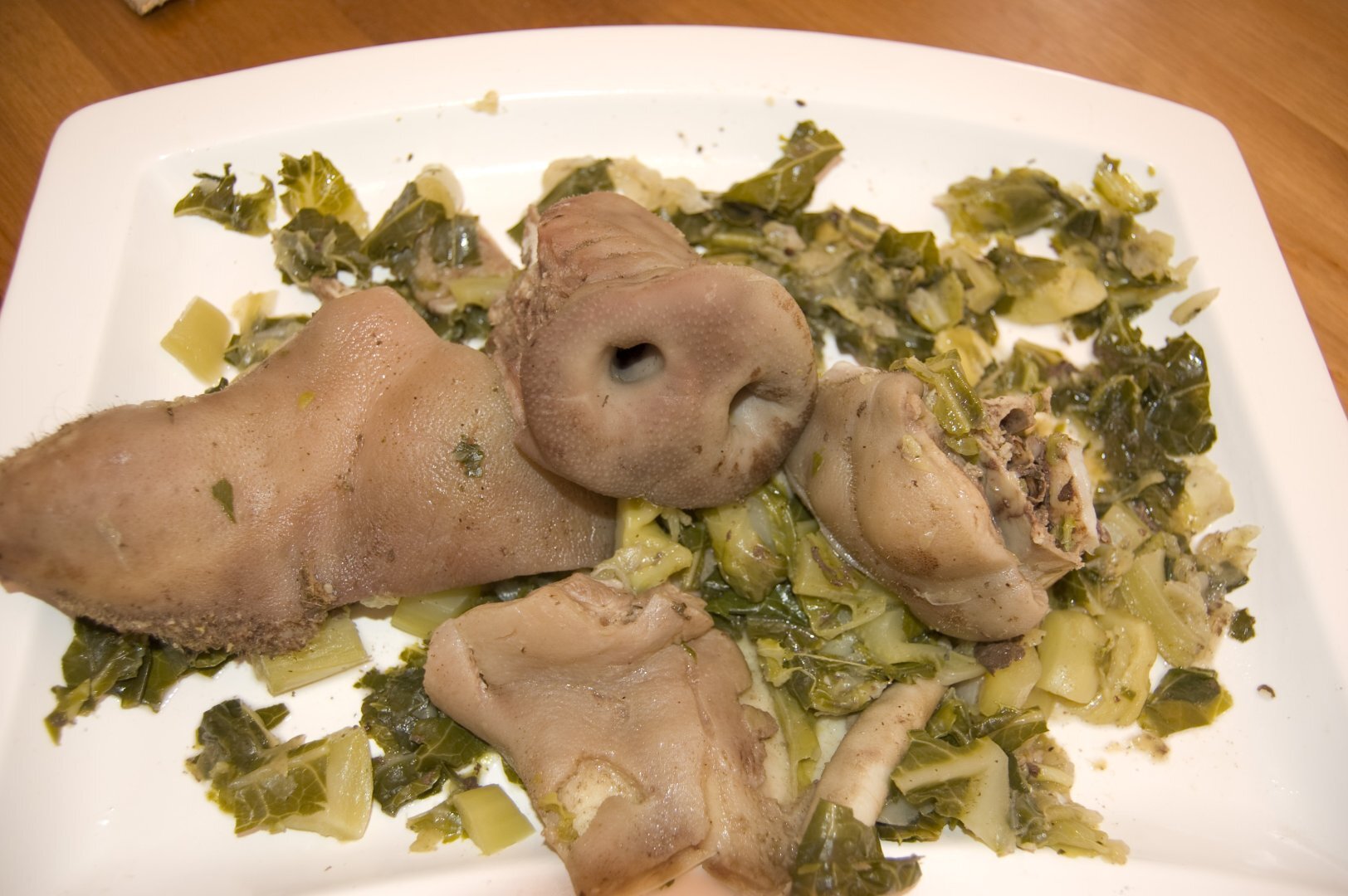 Oreilles et museau de porc à la paysanne. Recette Ptitchef