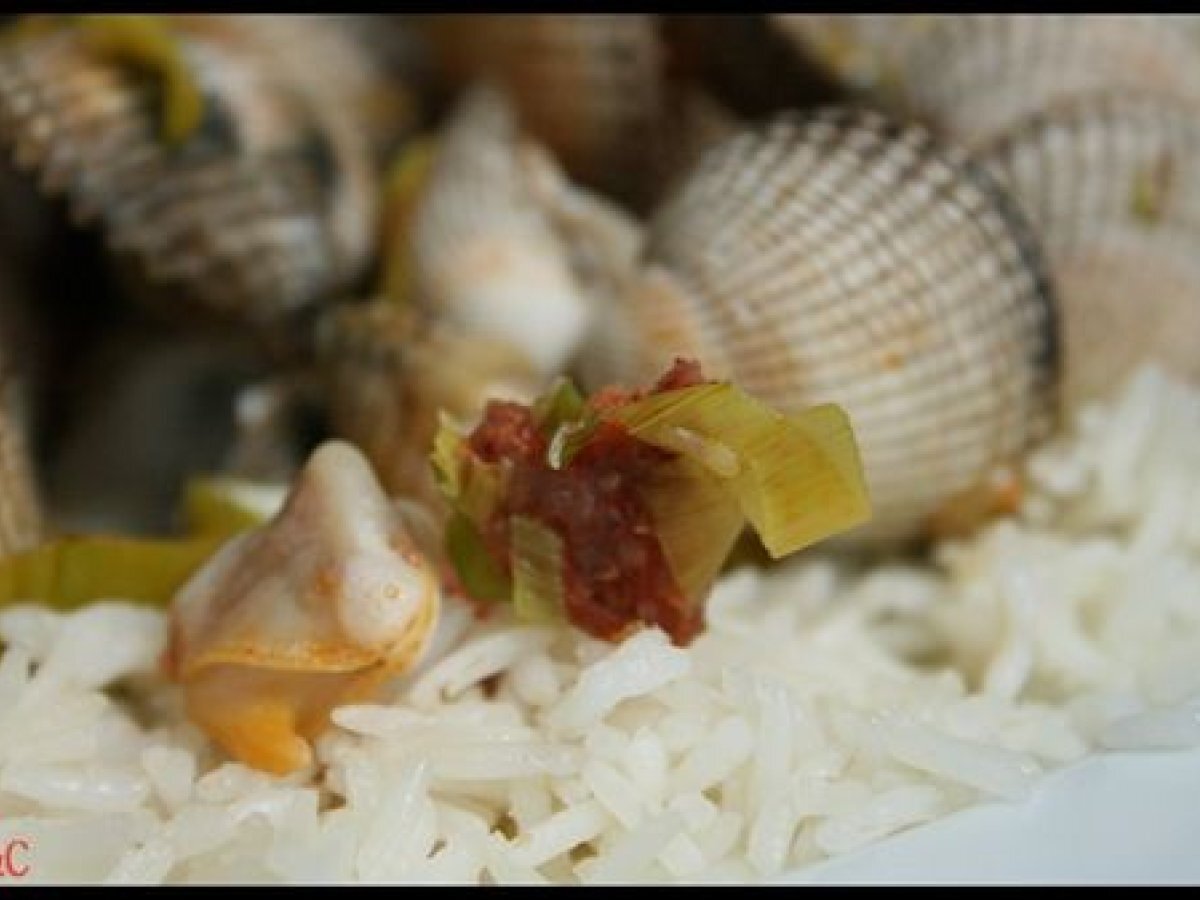 **poêlée de coques à la fondue de poireaux au chorizo** Recette Ptitchef