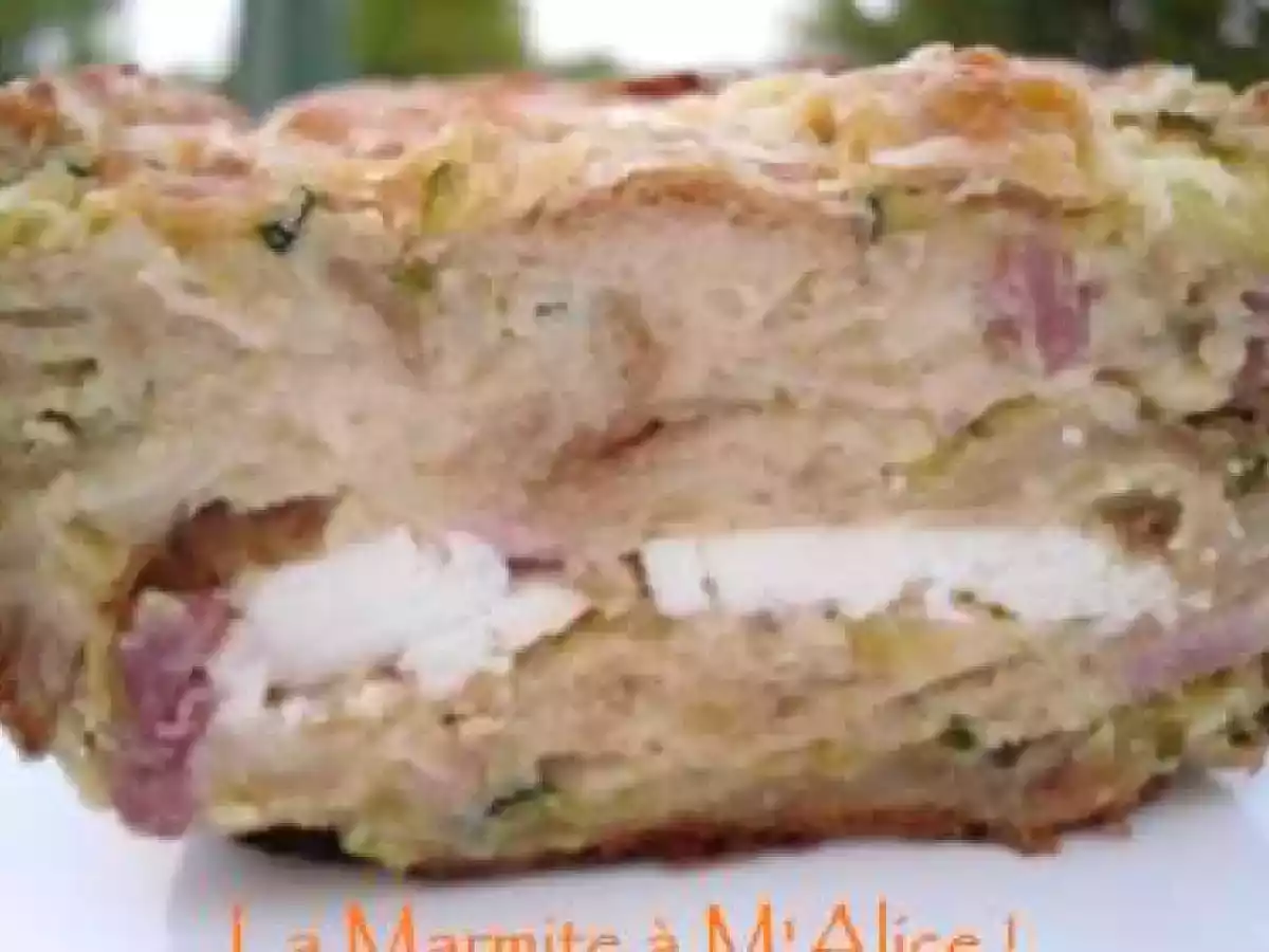 Pudding salé, oignons, courgettes, lardons, coeur de chèvre