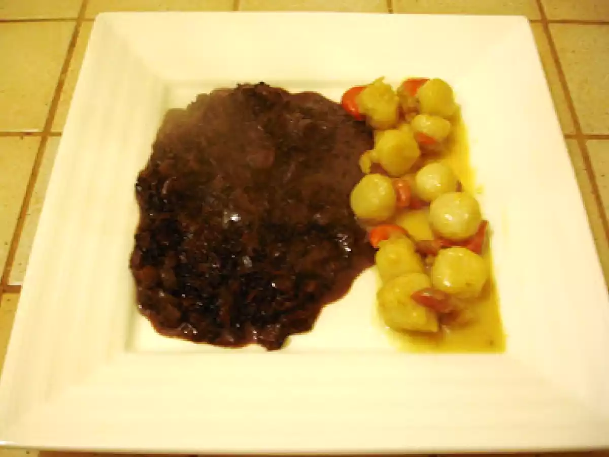 Risotto de riz Venere et noix de saint-jacques poêlées.