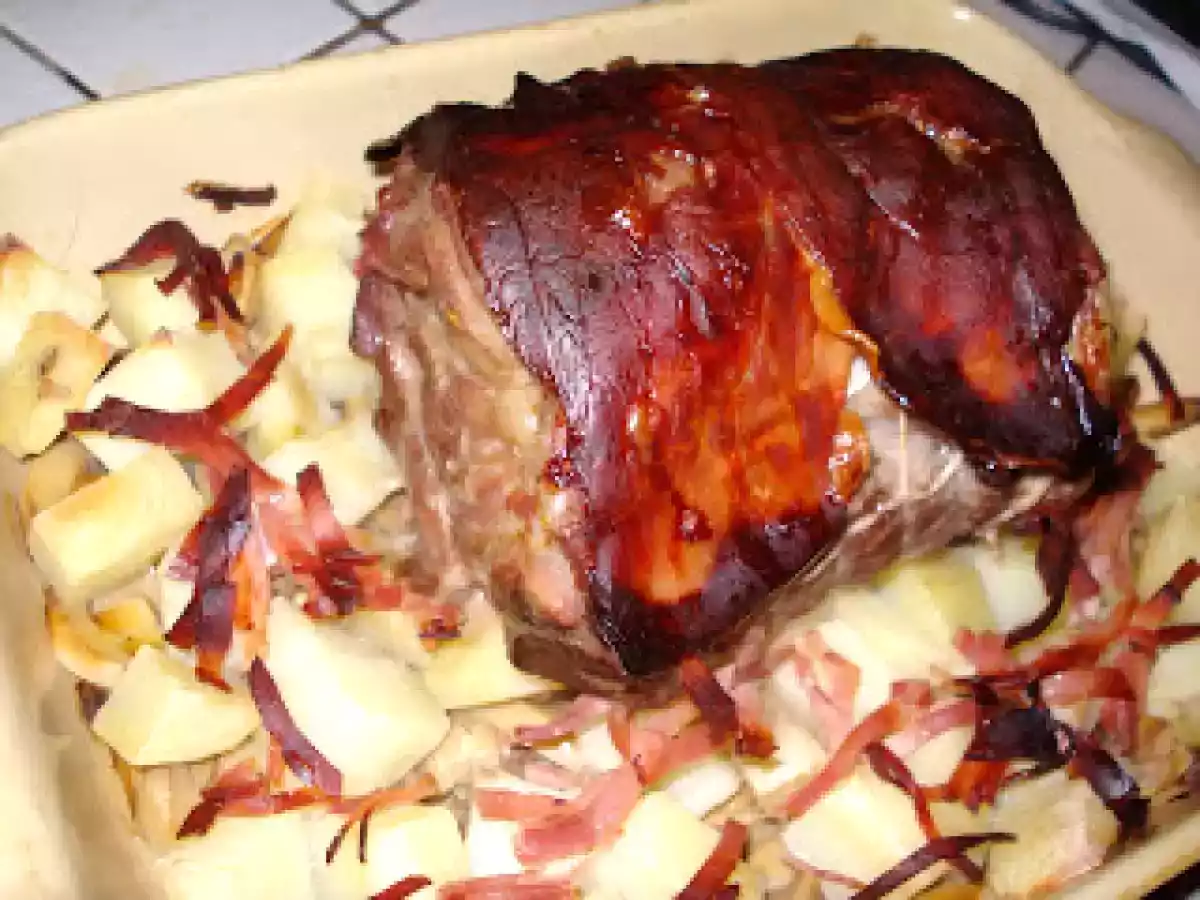 Rôti de porc au jambon cru et sa garniture