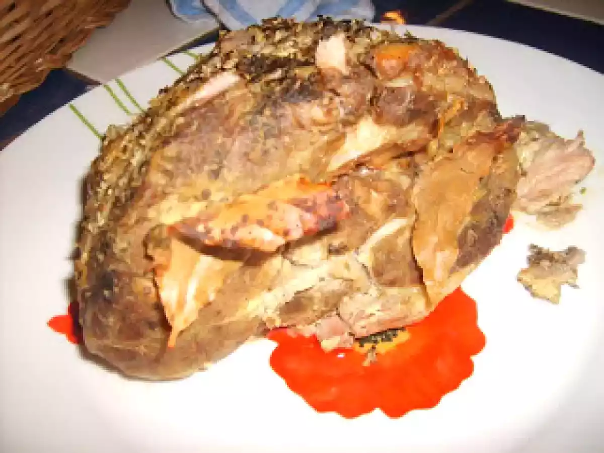 Rôti de porc en papillote à la moutarde et aux aromates.