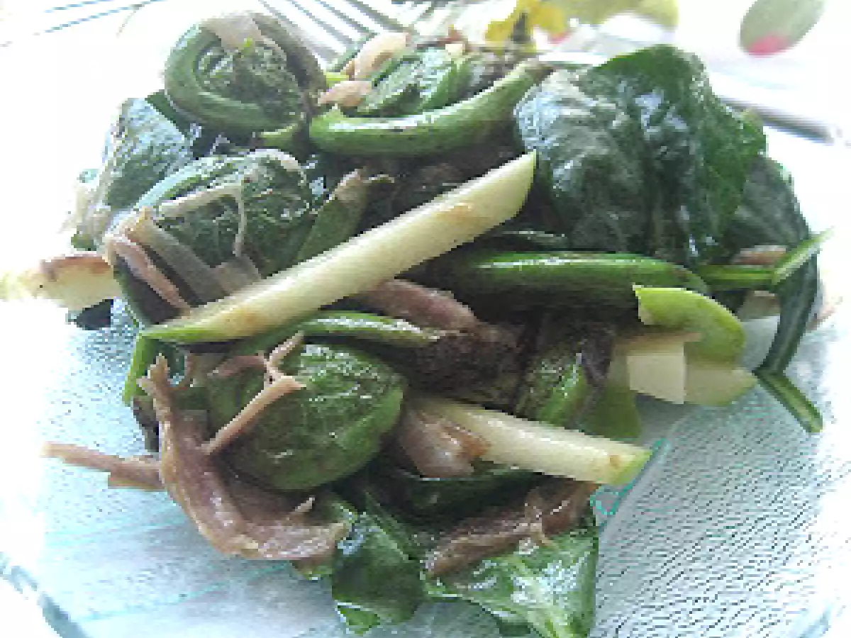 Salade tiède de canard confit et de têtes de violon