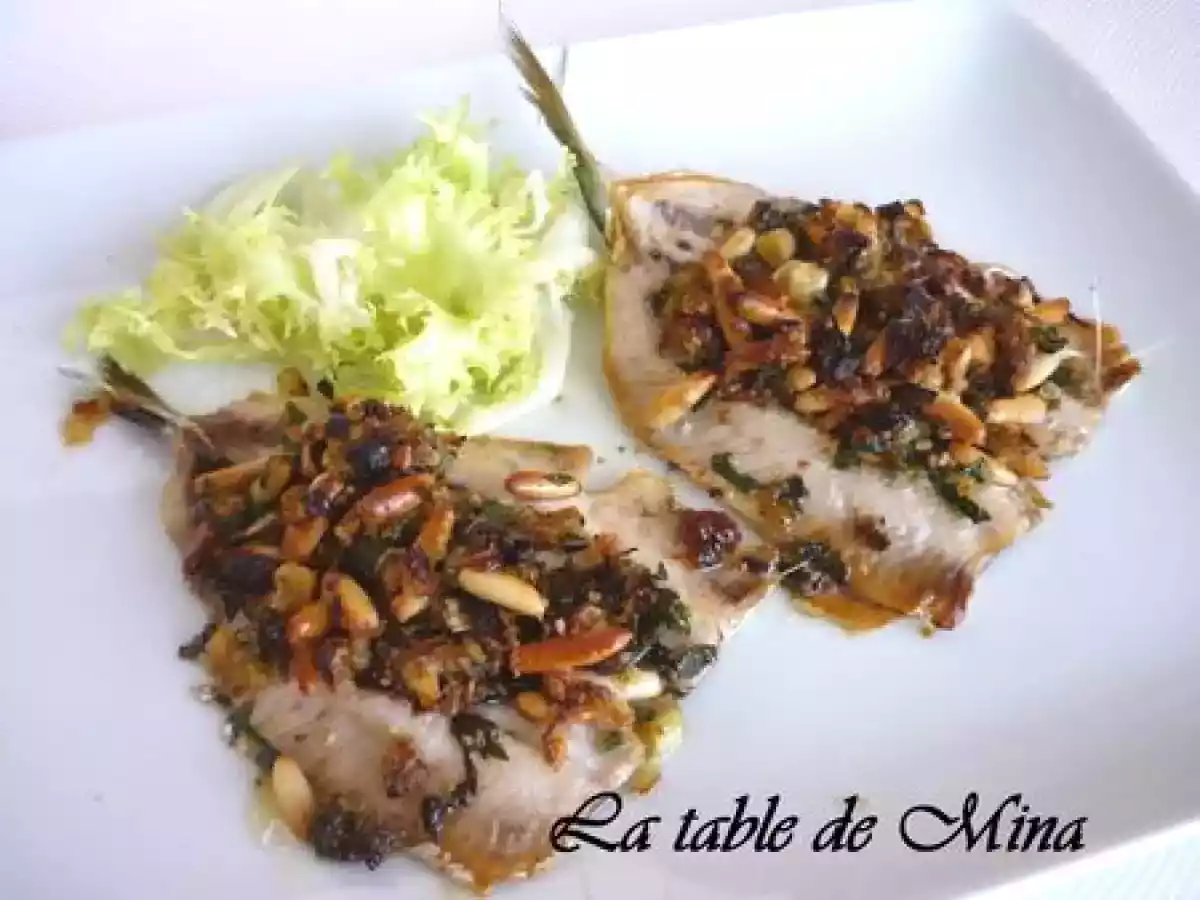 Sardines farcies, pignons, raisins secs, anchois et sauce oranges