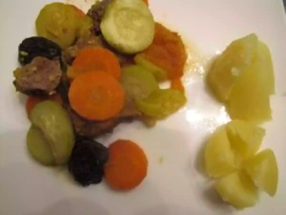 Tajine d'agneau aux abricots et aux pruneaux