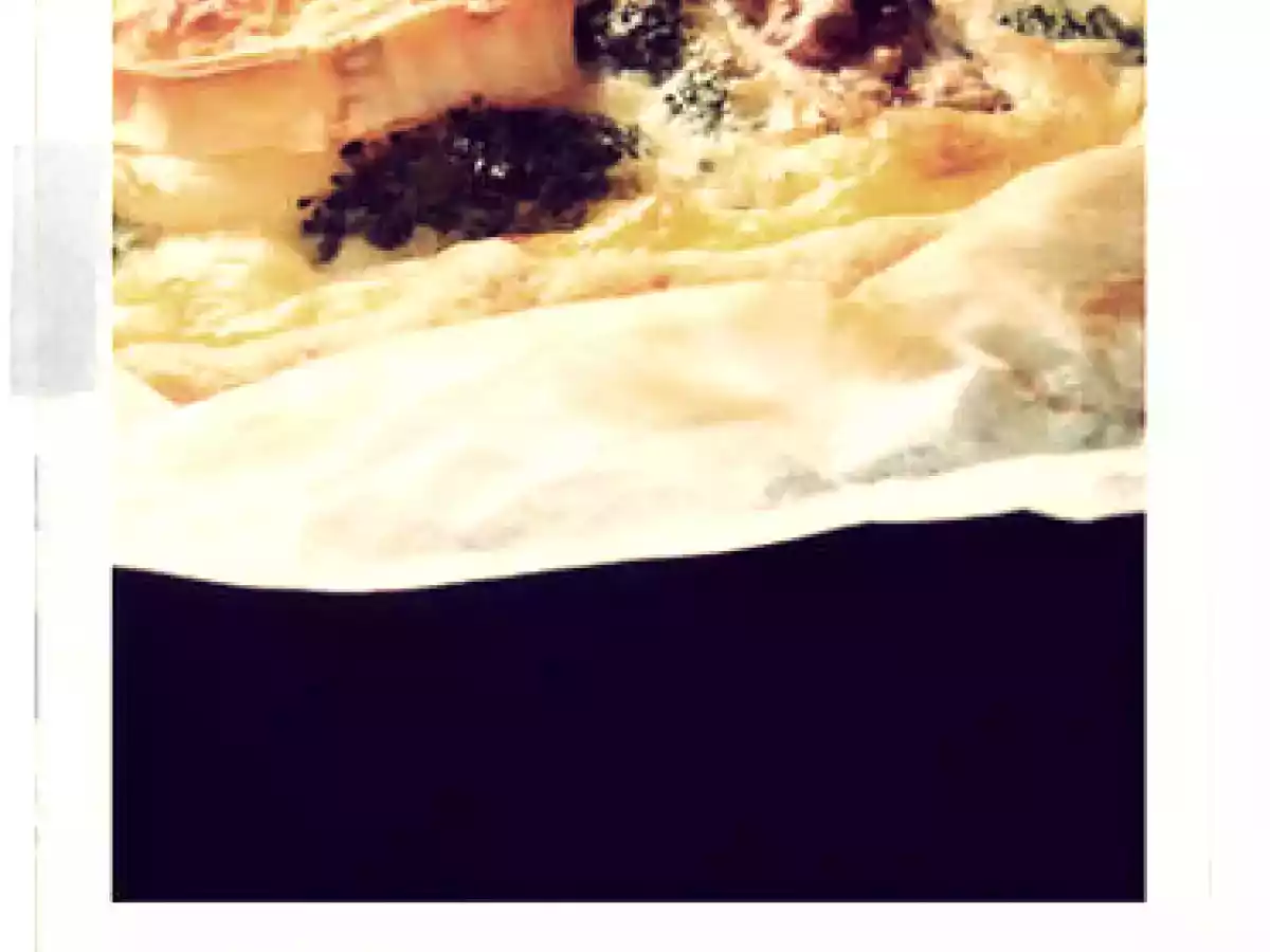 Tarte au brocolis, chèvre et cerneaux de noix.