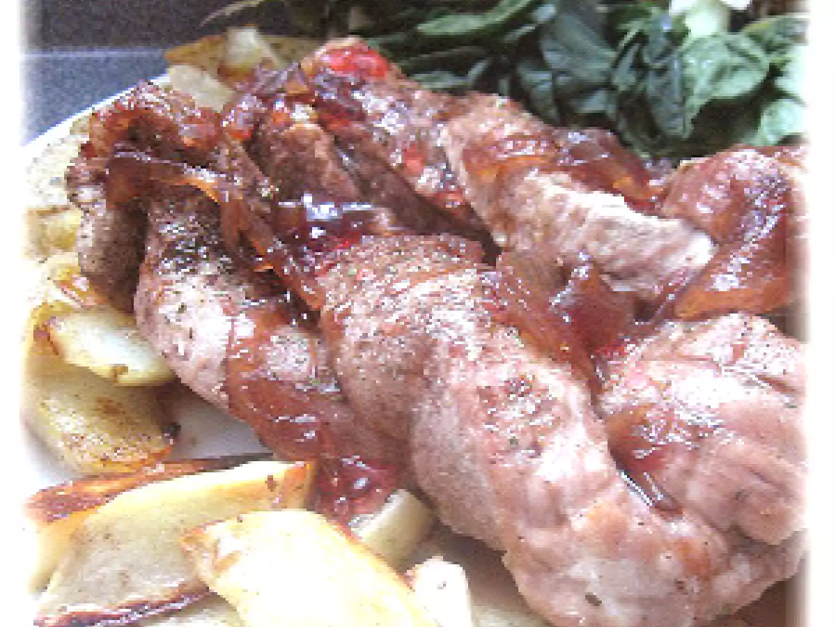 Torsades de porc, vinaigrette chaude au confit d'oignons et aux pommes