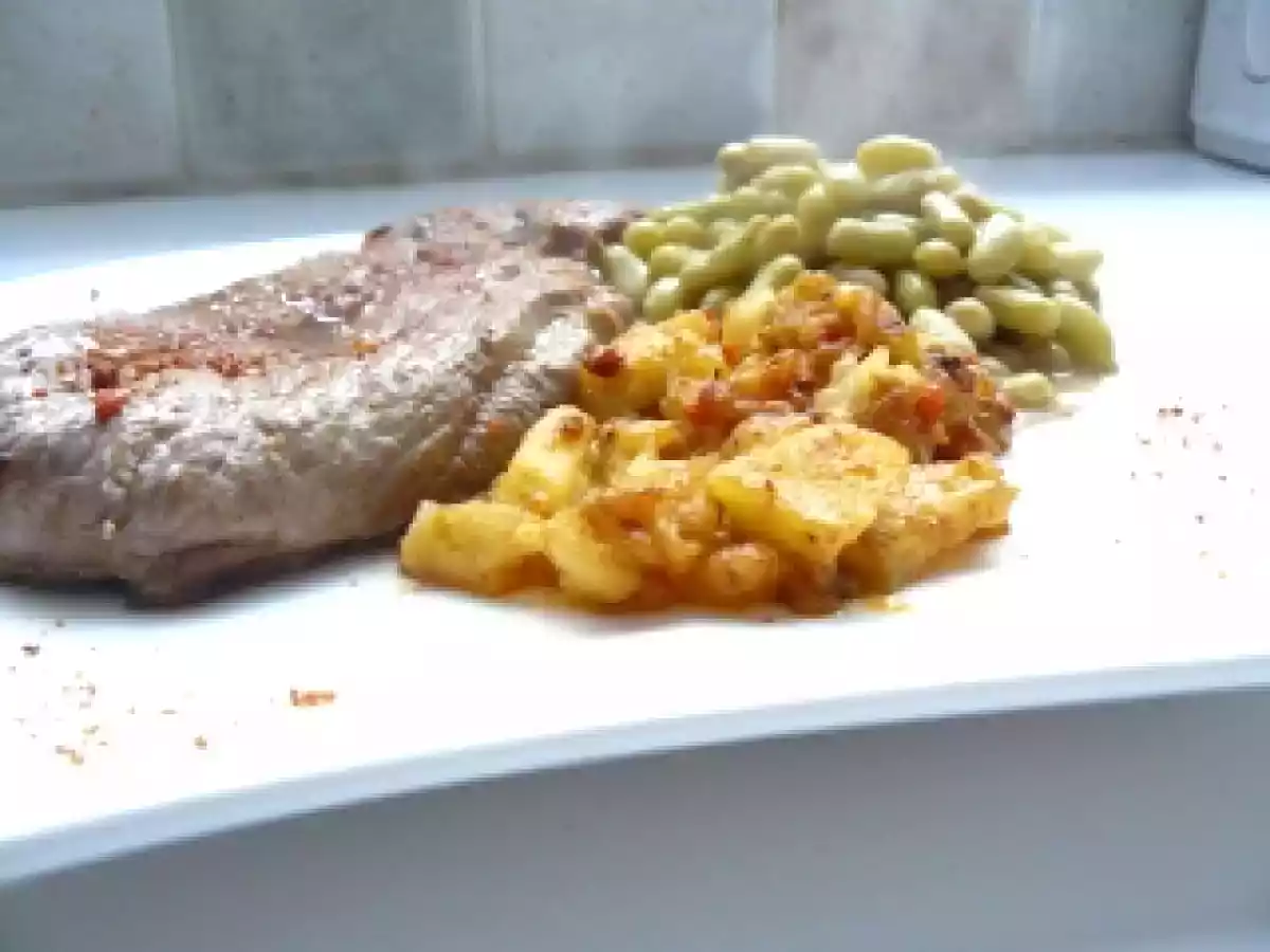 Tranche de gigot d'agneau, pommes au saté et flageolet cumin massalé.